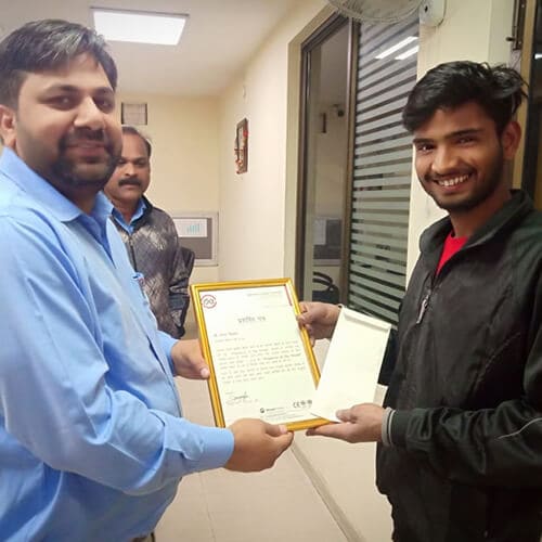 A person being given a certificate